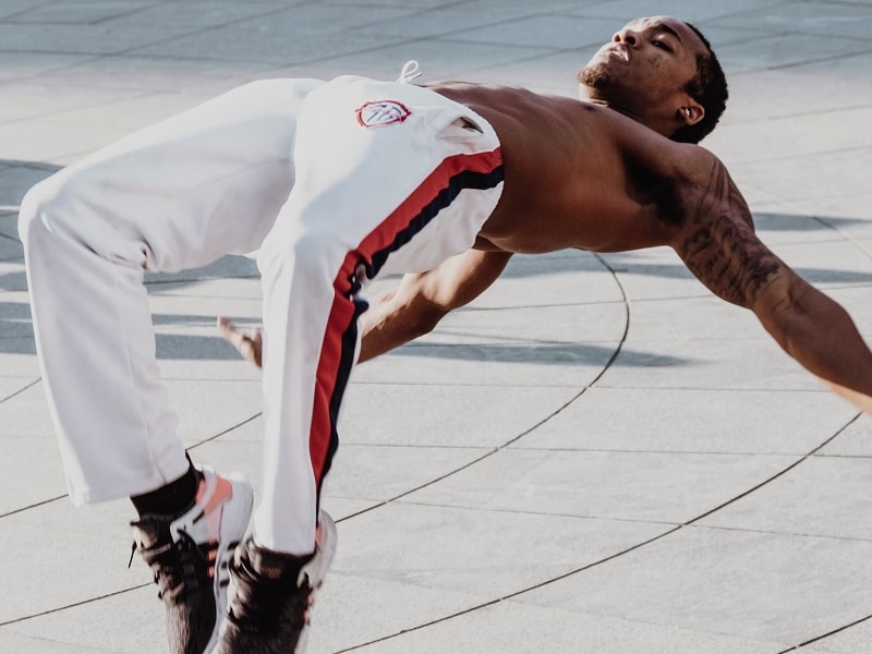 breakdancer jumping up from floor