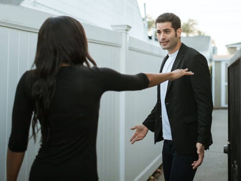 A man and woman arguing