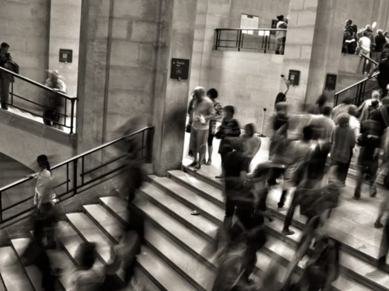 pedestrians rushing on stairs