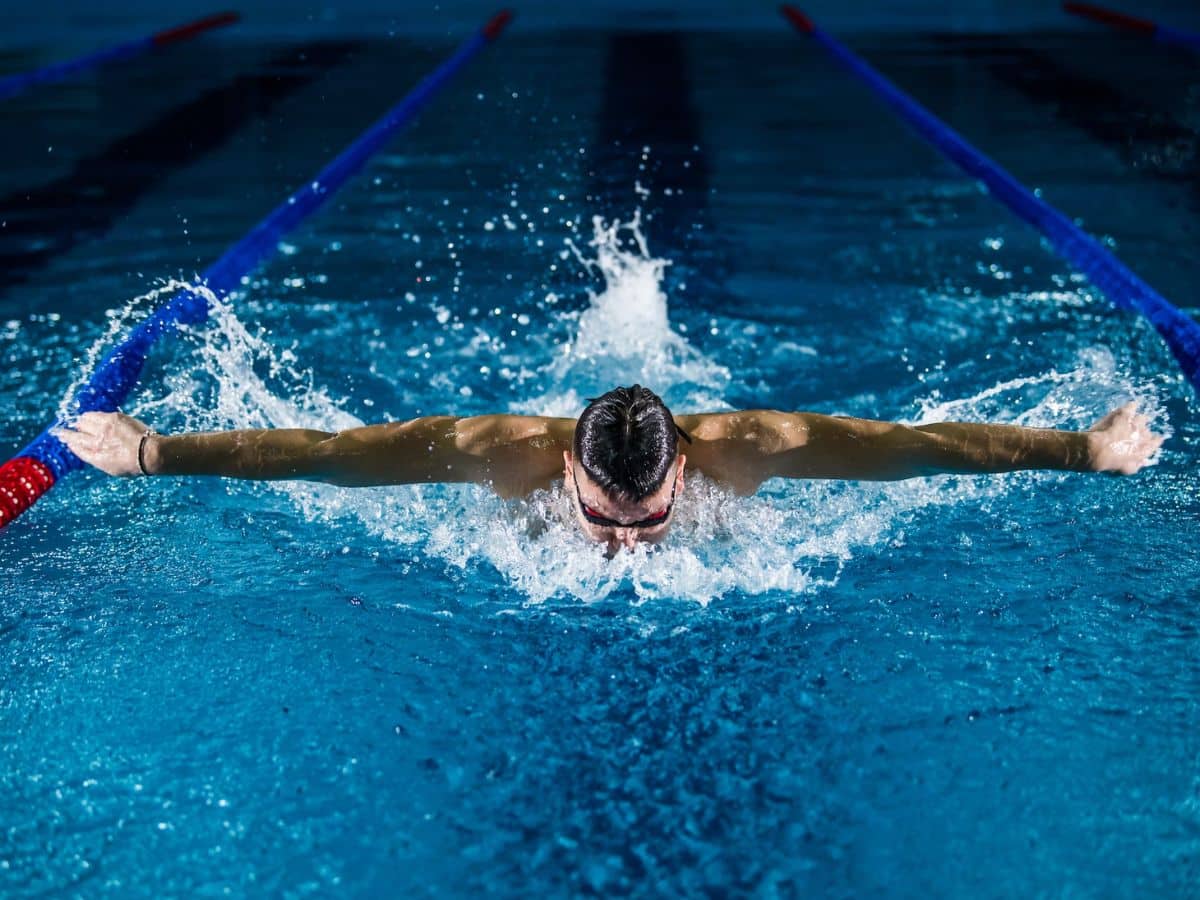 professional swimmer in pool