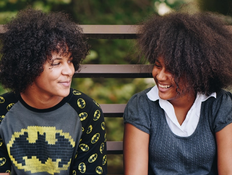 siblings laughing together