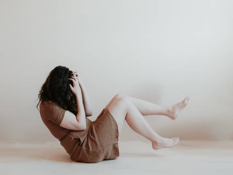 woman angry and frustrated on floor