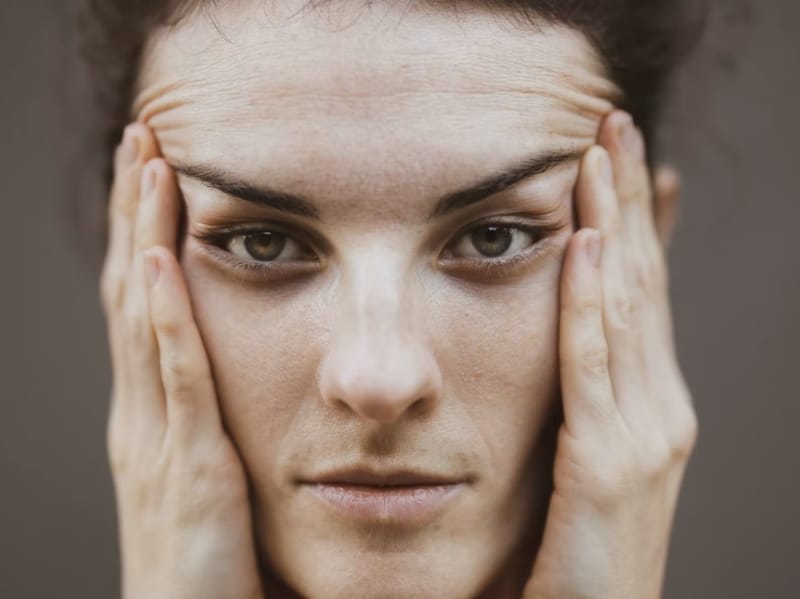 woman frowning and frustrated