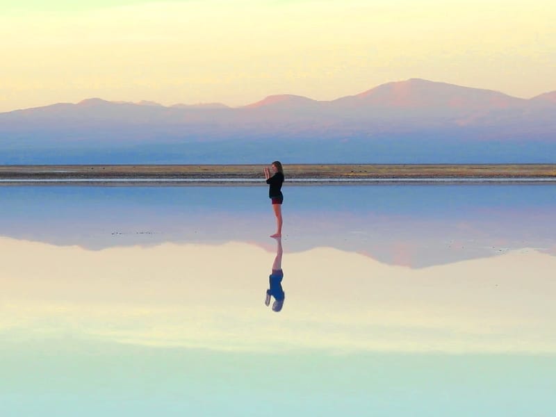 woman lake reflection