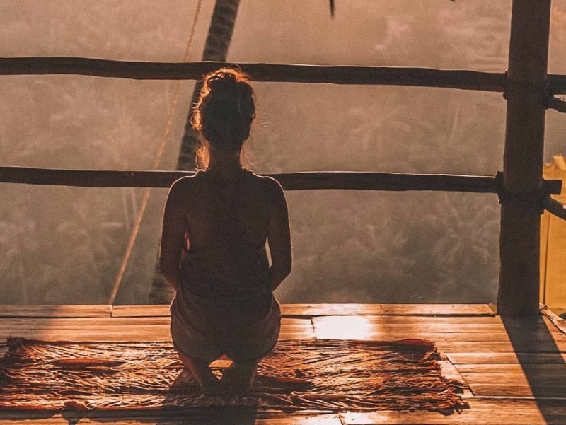 woman meditating outside