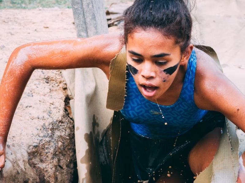 woman running in mud