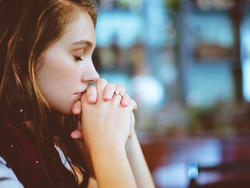 woman thinking praying