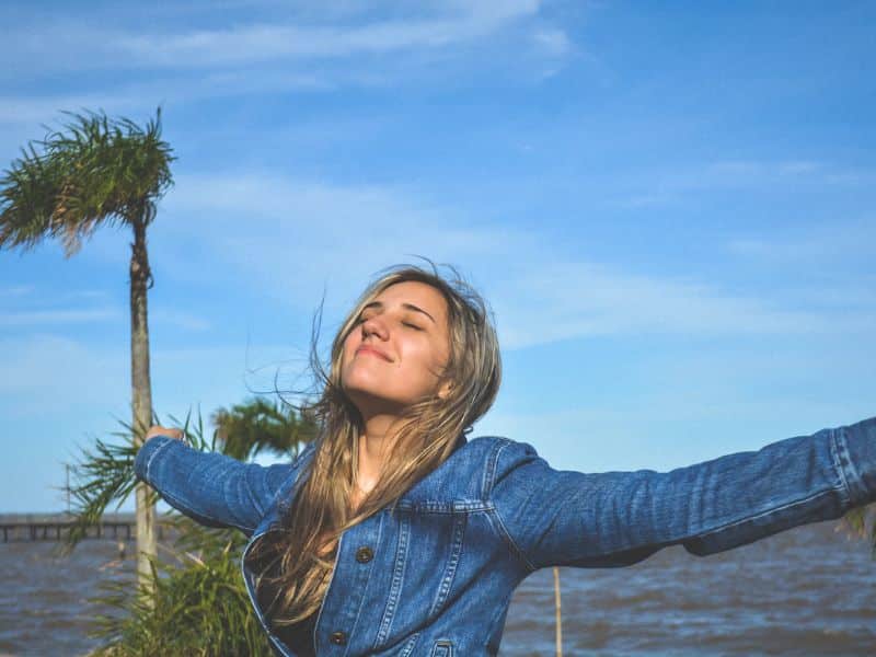 women expressing herself in nature