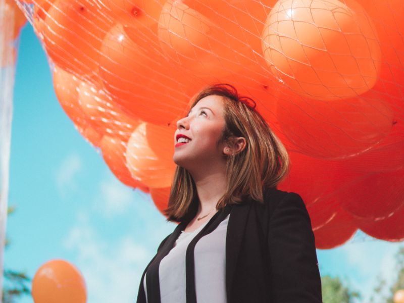 women happy with balloons