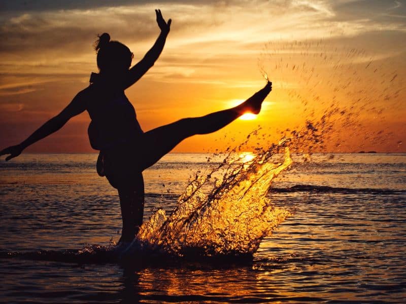 women playing with water